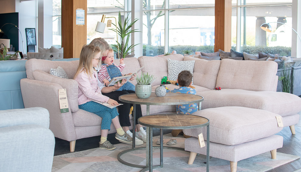 The Pioneer corner sofa in pink with a footstall from Sofaology